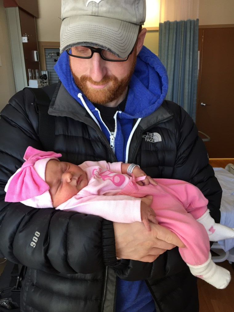 Daddy and Baby Z getting ready to come home for the first time. 